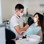 dentist-checking-patient-office (1)