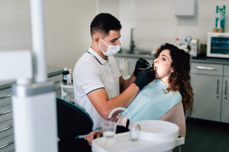 dentist-checking-patient-office (1)