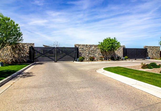 Entrance And Exit Wooden Gates To Secure Housing Development
