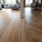 Laminate Flooring and Engineered Herringbone Flooring Together in the Same Home