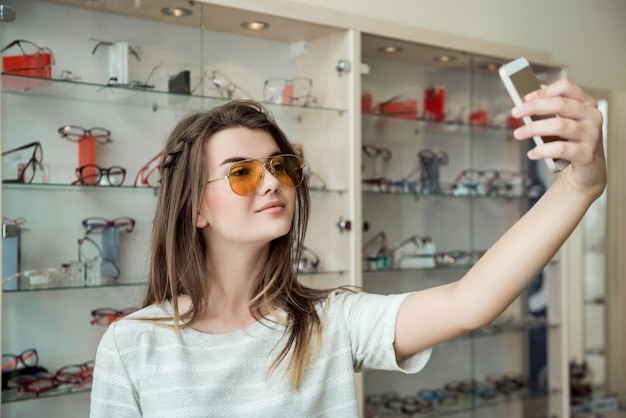 imgi_153_attractive-woman-went-shopping-alone-making-selfie-while-trying-new-stylish-sunglasses-optician-shop-sending-photo-friend_176420-3477