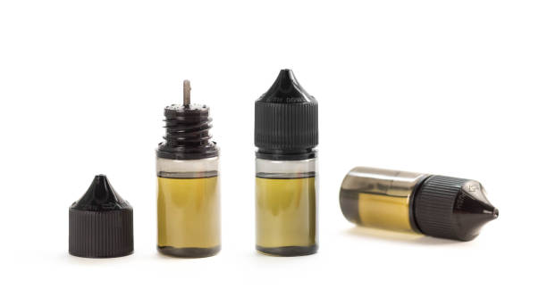 A bottles of liquid for an electronic cigarette. Close up.