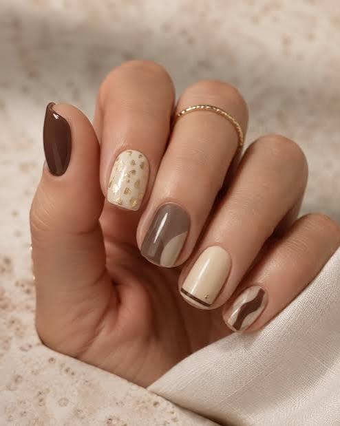 cream nails with gold