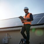 lucid-origin_A_photorealistic_image_of_a_solar_technician_or_inspector_standing_on_a_ladder_n-0