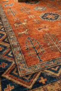 Close-up of hand-knotted rug craftsmanship