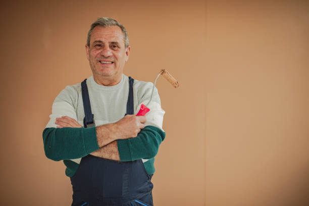 Portrait of a smiling painter